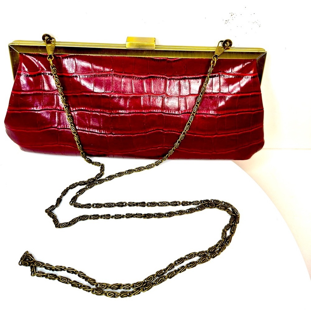 BANDOLINO Ruby Red clutch with antique gold tone closure and chain strap